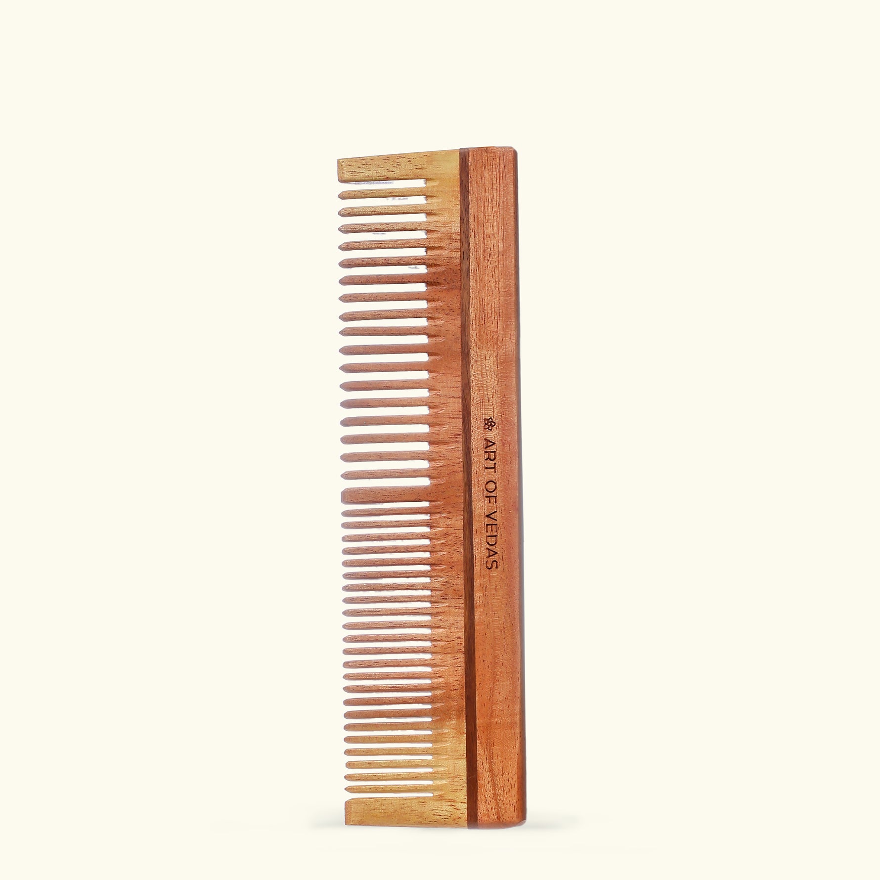 Experience the scalp-soothing power of Art of Vedas Neem Wood Comb, a unique comb made from antibacterial neem wood that gently removes tangles and impurities, leaving your scalp feeling refreshed and revitalized.